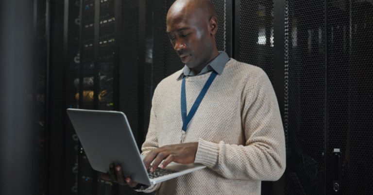 man at work using a laptop